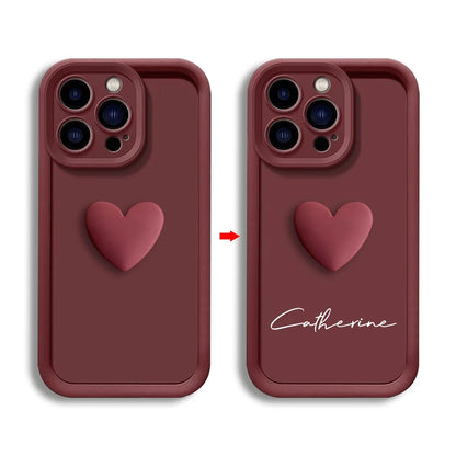 Deep burgundy CasePoppi protective phone cover with a minimalist 3D heart and personalized script.