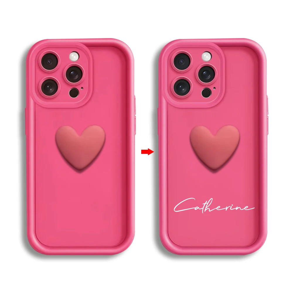 Vibrant hot pink CasePoppi phone case with a 3D heart element and customizable cursive name detailing.