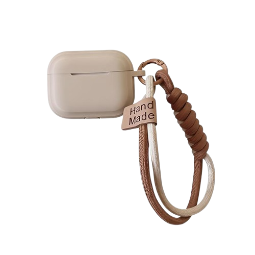 CasePoppi The Caramel Smile Bracelet Case in Milk Tea Beige, soft silicone protective AirPods shell with a cream and brown braided wristlet.