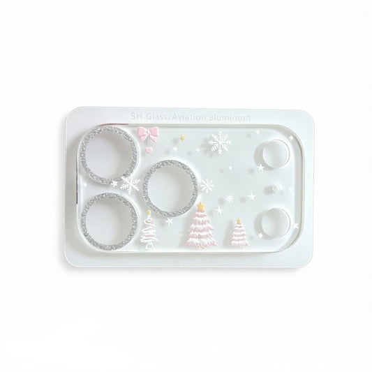 CasePoppi winter-themed camera lens protector with pink Christmas trees and snowflakes.