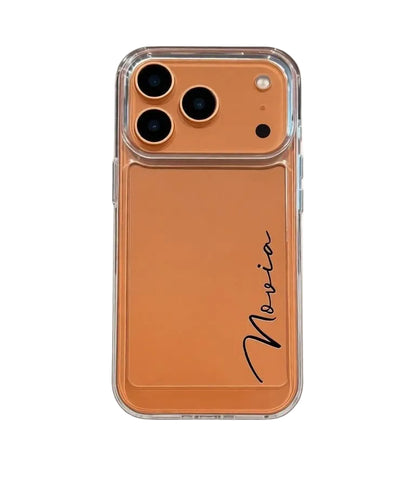 CasePoppi transparent phone case with a vibrant orange frame and personalized vertical signature.