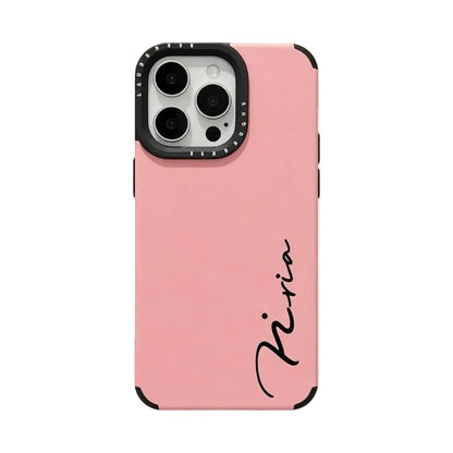 CasePoppi pink frosted leather phone case with a vertical custom cursive name signature.