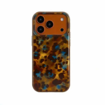 CasePoppi stylish leopard print phone case with a touch of blue tones and a contrasting orange camera protector.