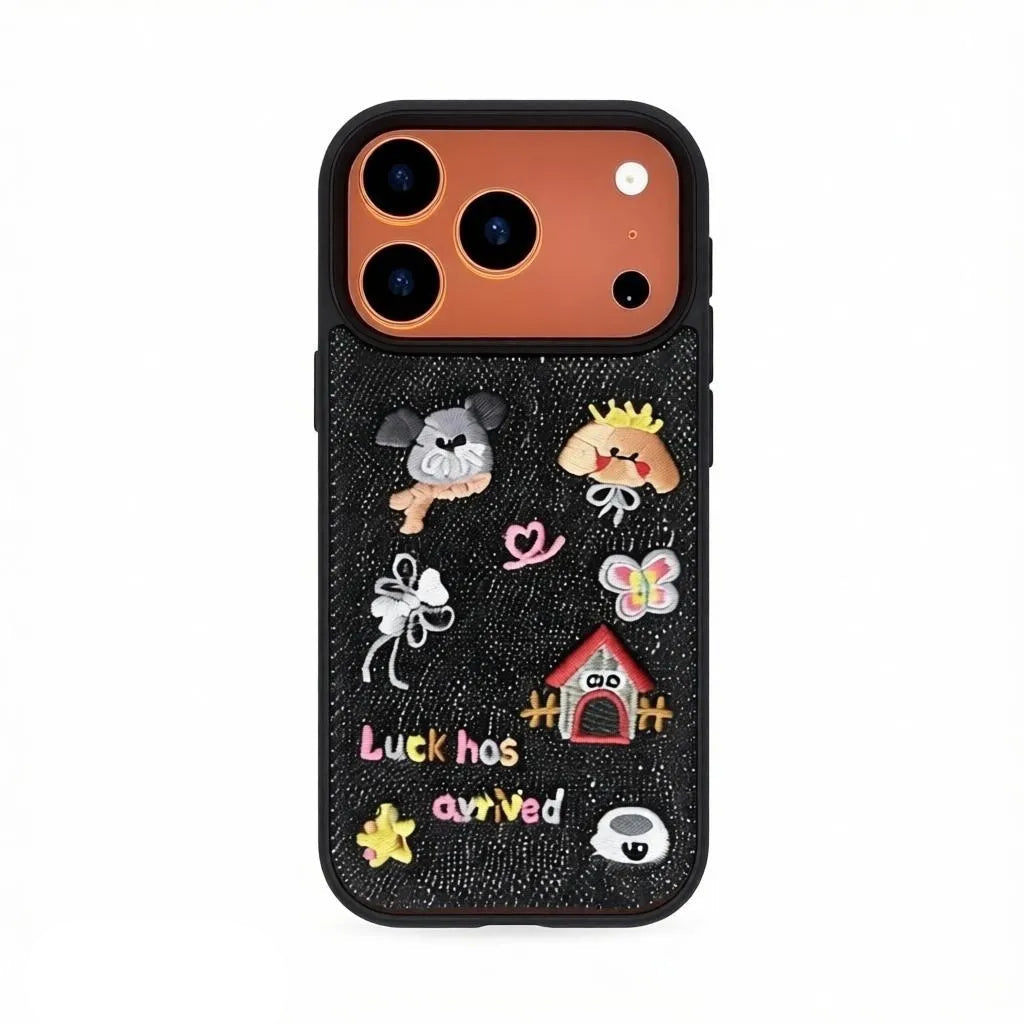 CasePoppi Lucky Puppy phone case with a black denim texture featuring embroidered puppies, stars, and hearts.