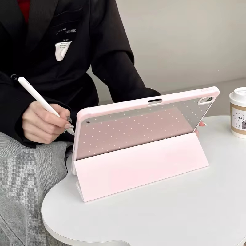 User in business attire using a stylus on a CasePoppi Pink Polka Dot iPad folding stand case, demonstrating sturdy viewing angle and stylus compatibility.