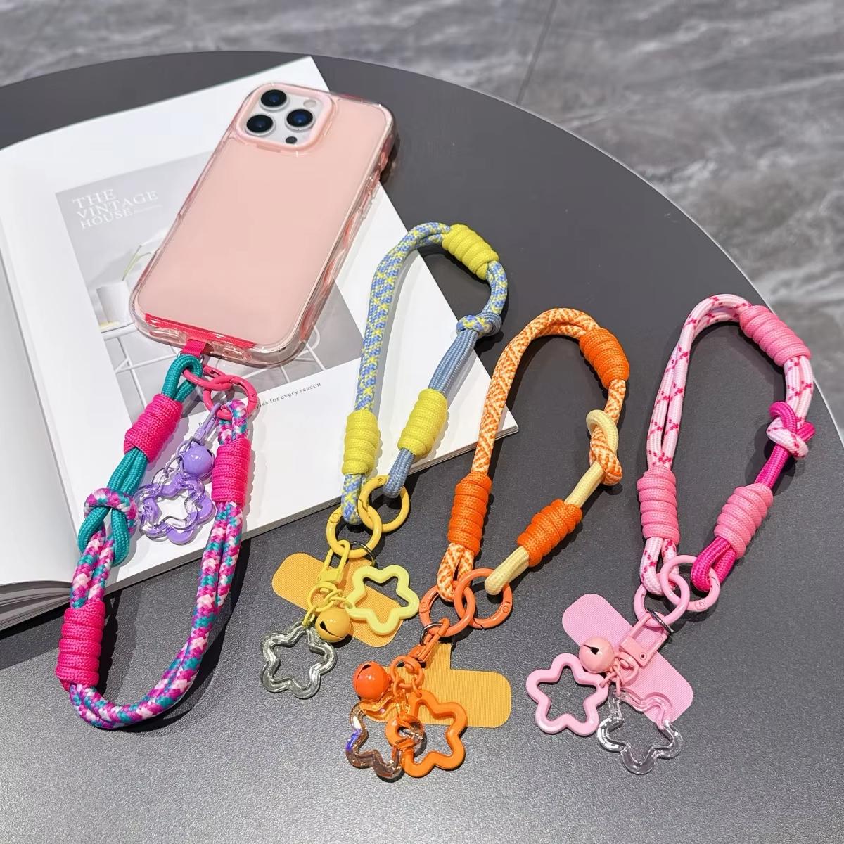 CasePoppi Braided Phone Lanyard assortment with a ripple texture clear phone case on display, demonstrating multiple colors including blue-green and pink crossbody use.