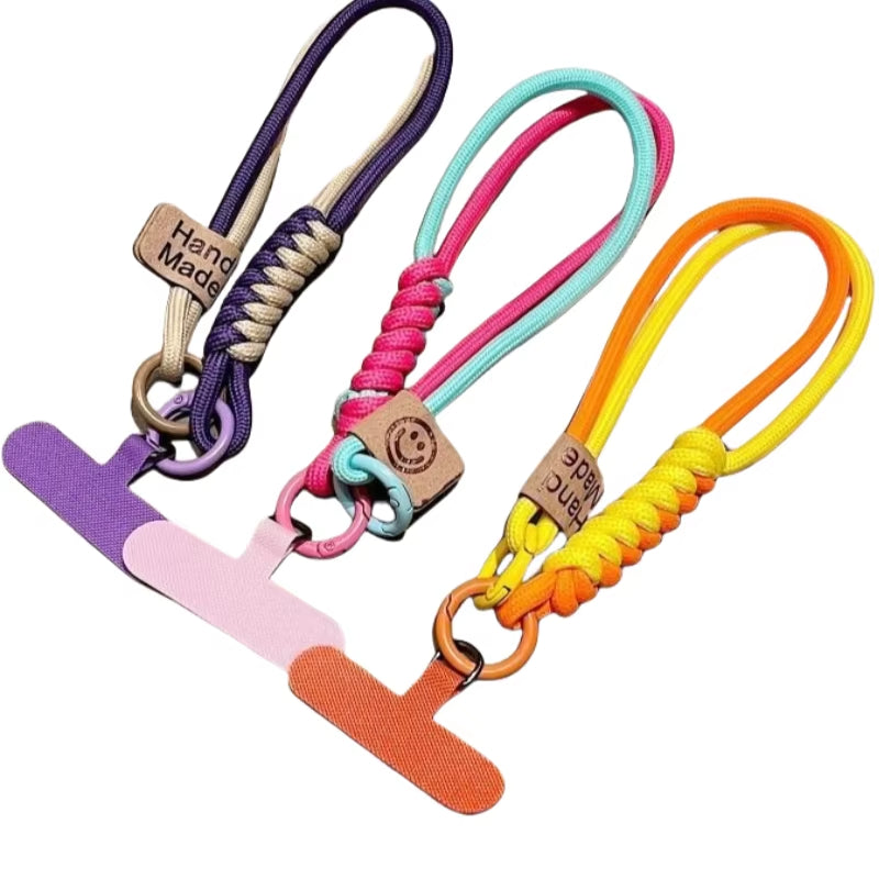 CasePoppi Braided Phone Strap Collection, showcasing multiple color-blocked cord variations with signature smiley leather tags and matching gaskets.