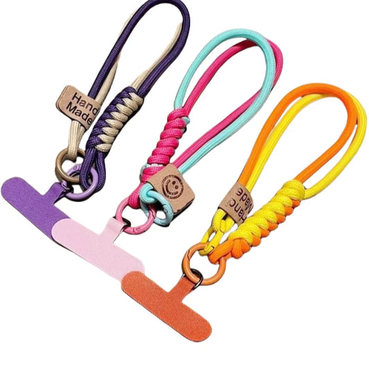 CasePoppi Braided Phone Strap Collection, showcasing multiple color-blocked cord variations with signature smiley leather tags and matching gaskets.