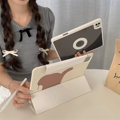 User holding a CasePoppi Puppy iPad Case and stylus, showing the integrated pencil holder slot and cute aesthetic in a lifestyle setting.