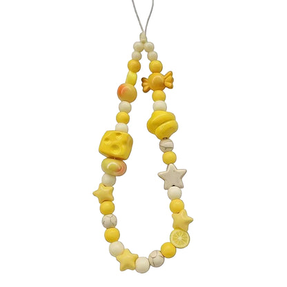 CasePoppi Cheese and Lemon Foodie Beaded Phone Charm, featuring a yellow cheese cube bead, fresh lemon slice bead, stars, and assorted yellow and white fruit beads, colorful Y2K style.
