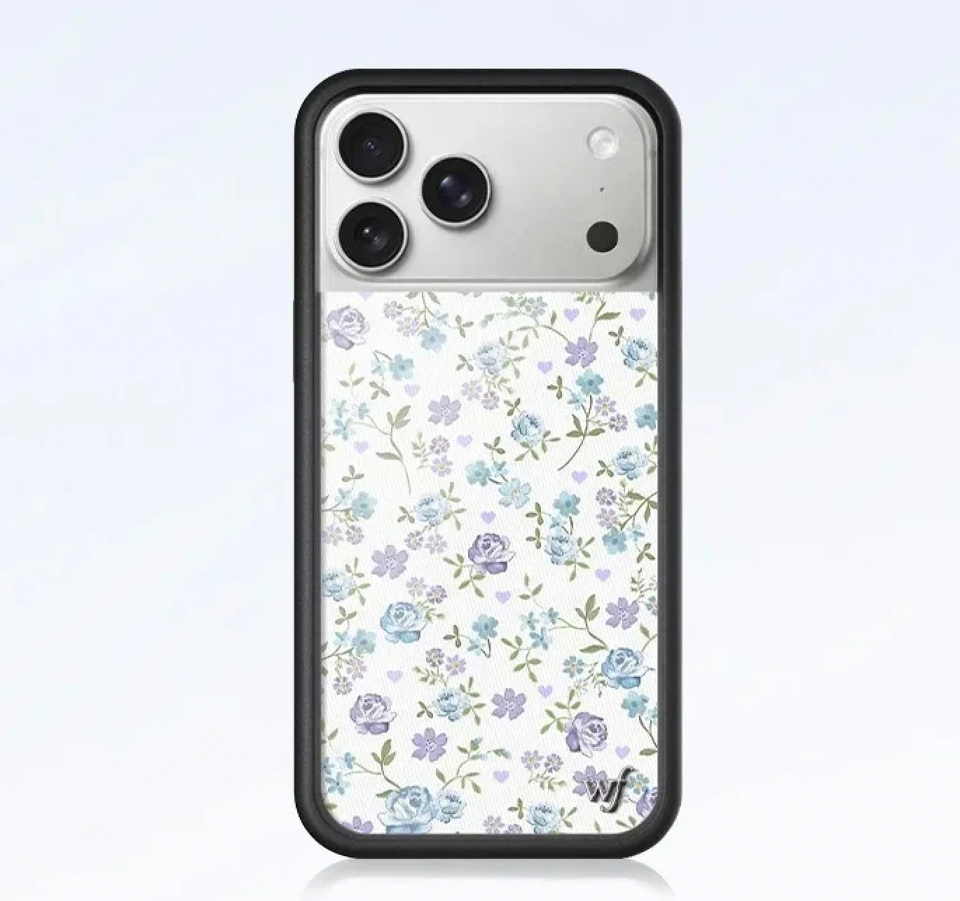 Cute blue dainty floral pattern phone case for iPhone 17 Pro, clear cover with small purple flowers and heart print, protective black bumper.