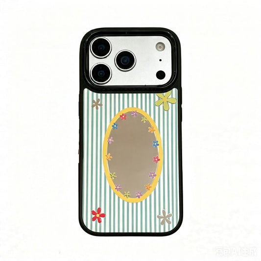 Sage green striped phone case with daisy-framed oval mirror