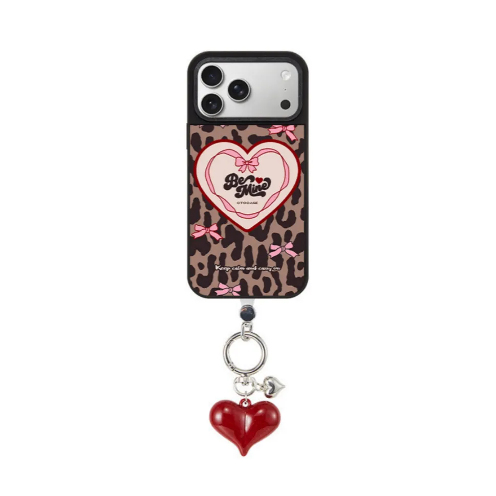 Leopard print heart phone case with red heart charm